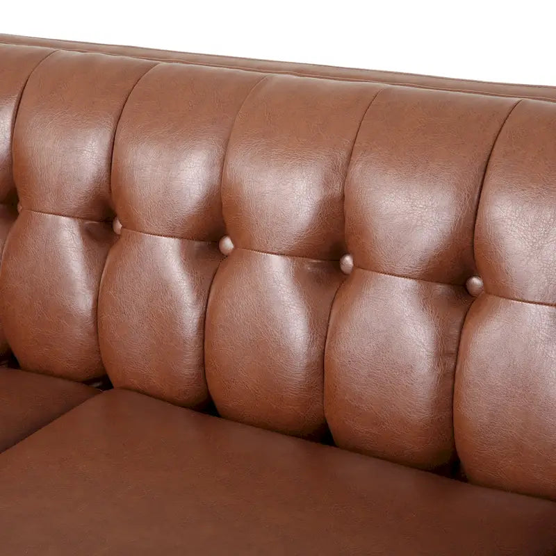 Dreiseitiges Sofa aus Kunstleder mit Knopfheftung
